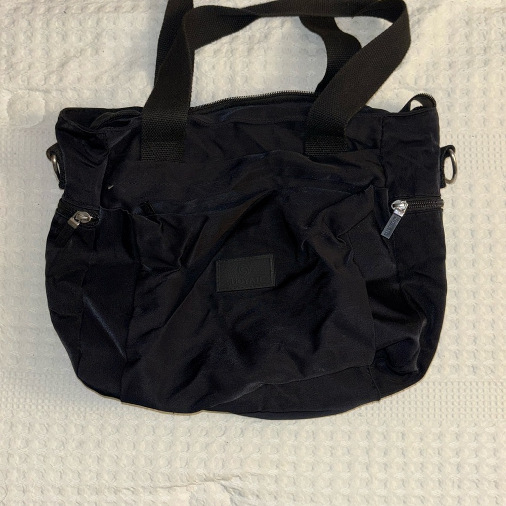 Black off brand bag